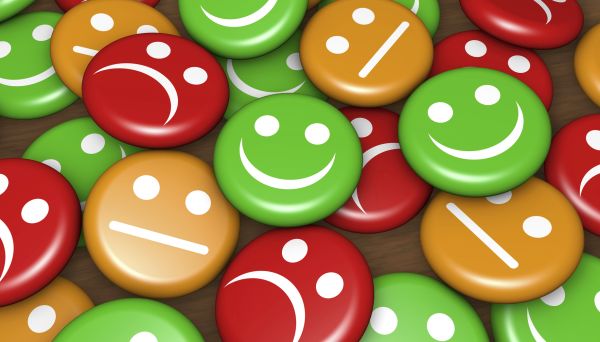 Business quality service customer feedback, rating and survey with happy and not smiling face emoticon symbol and icon on badges button.
